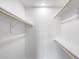Bright, walk-in closet features shelving for storage at 3011 E John Cabot Dr, Phoenix, AZ 85032