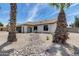 Inviting home boasting a well-kept yard, arched doorway, desert landscaping, and charming curb appeal at 3011 E John Cabot Dr, Phoenix, AZ 85032