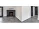 Comfortable living room featuring a brick fireplace and tile flooring at 3011 E John Cabot Dr, Phoenix, AZ 85032