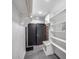 Mudroom with bench seating, white shelving, and storage cabinets near interior entry doors at 3011 E John Cabot Dr, Phoenix, AZ 85032