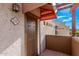 A close up view of the private entry door of unit 214, with an awning at 3434 E Baseline Rd # 214, Phoenix, AZ 85042