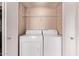 A compact laundry area with a washer and dryer at 3434 E Baseline Rd # 214, Phoenix, AZ 85042