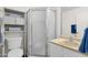 Bathroom includes shower, toilet, and storage at 3491 N Arizona Ave # 118, Chandler, AZ 85225