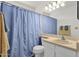 Bright bathroom featuring a shower-tub combination and modern fixtures at 3491 N Arizona Ave # 118, Chandler, AZ 85225