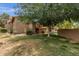 Charming condo featuring lush lawn, privacy fence, and mature shade trees offering a park-like setting at 3491 N Arizona Ave # 118, Chandler, AZ 85225