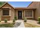 Inviting home entrance featuring a decorative welcome sign and tidy landscaping at 3491 N Arizona Ave # 118, Chandler, AZ 85225