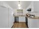 Bright kitchen featuring white cabinetry and stainless steel appliances at 3491 N Arizona Ave # 118, Chandler, AZ 85225