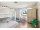 A bedroom featuring a bunk bed, closet, and natural lighting at 3605 W Pecos Rd, Chandler, AZ 85226