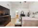 A main bedroom with a decorative light fixture and natural lighting at 3605 W Pecos Rd, Chandler, AZ 85226