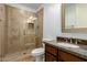 Bathroom featuring glass enclosed shower, and a dark wood vanity at 36600 N Cave Creek Rd # C7, Cave Creek, AZ 85331