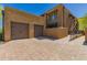 Inviting home featuring a multi-car garage and a charming, rustic exterior at 36600 N Cave Creek Rd # C7, Cave Creek, AZ 85331