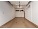 Clean and open two car garage with lighting and shelving at 36600 N Cave Creek Rd # C7, Cave Creek, AZ 85331