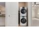Conveniently located laundry closet with stacked washer and dryer in the hallway at 36600 N Cave Creek Rd # C7, Cave Creek, AZ 85331