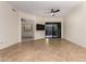 Bright, spacious living room with tile flooring and modern ceiling fan at 36600 N Cave Creek Rd # C7, Cave Creek, AZ 85331