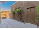 Paver patio with access to additional storage and desert landscaping at 36600 N Cave Creek Rd # C7, Cave Creek, AZ 85331
