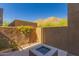 Private courtyard with mountain views features a stone fire pit at 36600 N Cave Creek Rd # C7, Cave Creek, AZ 85331