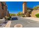 Desert community view featuring a paved street leading to a bridge and residential buildings at 36600 N Cave Creek Rd # C7, Cave Creek, AZ 85331