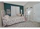 Comfortable bedroom with cozy bed, colorful accents, and natural light at 3812 W Carlos Ln, San Tan Valley, AZ 85144