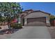 Charming single-Gathering home boasts a well-manicured front yard and a two-car garage at 3812 W Carlos Ln, San Tan Valley, AZ 85144