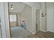 Hallway view showcases an entry to a bedroom and carpeted room at 3812 W Carlos Ln, San Tan Valley, AZ 85144