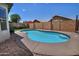 A serene pool oasis nestled in a private backyard, surrounded by mature landscaping, and providing an escape at 3812 W Carlos Ln, San Tan Valley, AZ 85144