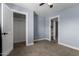 Cozy bedroom featuring plush carpeting and a spacious closet for ample storage at 4028 W El Camino Dr, Phoenix, AZ 85051