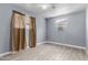 Well-lit bedroom with vinyl floors, window, and ceiling fan at 4028 W El Camino Dr, Phoenix, AZ 85051