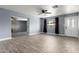 Spacious living room featuring tile flooring, ceiling fan and natural light at 4028 W El Camino Dr, Phoenix, AZ 85051