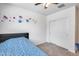 Comfortable bedroom with a closet and cheerful floral wall decorations at 4218 W Palace Station Rd, New River, AZ 85087