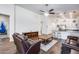 Inviting living room with tile floors and comfortable leather seating area at 4218 W Palace Station Rd, New River, AZ 85087