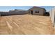 View of the backyard featuring a dirt lot with perimeter fencing at 4256 W Lisa Ln, San Tan Valley, AZ 85144