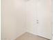 Bright entryway featuring tile flooring and a white entry door at 4256 W Lisa Ln, San Tan Valley, AZ 85144