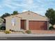 Charming single-story home with a well-maintained front yard and a two-car garage at 4256 W Lisa Ln, San Tan Valley, AZ 85144