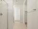 Bright hallway with tiled flooring leading to rooms with carpet and closet at 4256 W Lisa Ln, San Tan Valley, AZ 85144
