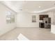 Open kitchen and dining space with stainless steel appliances and ample natural light at 4256 W Lisa Ln, San Tan Valley, AZ 85144