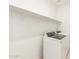 Clean laundry room featuring modern washer and dryer and overhead shelf at 4256 W Lisa Ln, San Tan Valley, AZ 85144