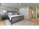 Bright bedroom with large windows, brick accent wall, and a cozy rug at 4411 N 40Th N St # 37, Phoenix, AZ 85018