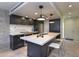 Modern kitchen featuring an island with seating, modern appliances, and sleek countertops at 4411 N 40Th N St # 37, Phoenix, AZ 85018