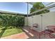 Private patio area with brick flooring and well-maintained landscaping provides a relaxing outdoor space at 4411 N 40Th N St # 37, Phoenix, AZ 85018