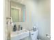 Clean powder room featuring modern sink, toilet, and finishes at 4411 N 40Th N St # 37, Phoenix, AZ 85018