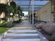 Scenic covered walkway with stone details and manicured landscaping leading to property amenities at 4411 N 40Th N St # 37, Phoenix, AZ 85018
