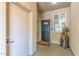 Inviting entryway with stylish decor, a decorative front door, and a welcoming 