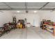 Spacious garage with epoxy floors, ample storage, and room for multiple vehicles at 4446 W Kimberly Way, Glendale, AZ 85308
