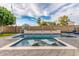 Sparkling pool featuring a waterfall feature, pavers, and plenty of space for lounging at 4446 W Kimberly Way, Glendale, AZ 85308