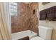 Bathroom with a tub/shower, tiled walls, and a linen curtain at 4515 E Casey Ln, Cave Creek, AZ 85331