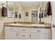 Bathroom featuring double sinks, granite counters, and a neutral color scheme at 4515 E Casey Ln, Cave Creek, AZ 85331