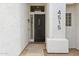 Inviting front entrance with a secure door, stylish lighting, and clear address display at 4515 E Casey Ln, Cave Creek, AZ 85331
