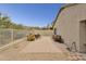 Expansive backyard with brick patio, comfortable seating, and a secure fence, perfect for outdoor living at 4718 E Woburn Ln, Cave Creek, AZ 85331