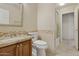 The bathroom features a stylish vanity with granite counters and a decorative backsplash, along with tile flooring at 4718 E Woburn Ln, Cave Creek, AZ 85331