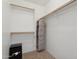 Walk in closet featuring built in shelves and carpet flooring at 4718 E Woburn Ln, Cave Creek, AZ 85331